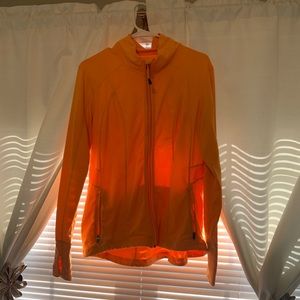 Bright orange workout jacket